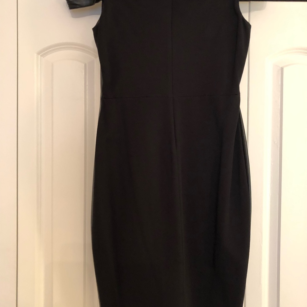 Off the shoulders faux leather dress.